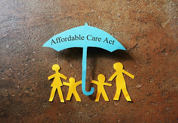 Affordable Care Act paper family stock photo
