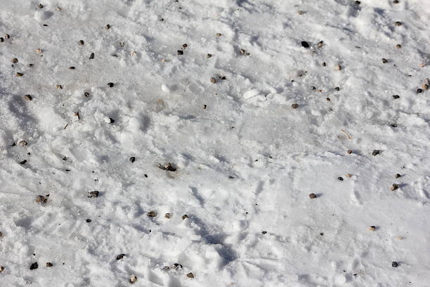 istock Grit in Snow, Road Pavement, Winter, Crushed Stones 475413841