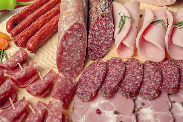 istock smoked meat on wood isolated white background 475417052
