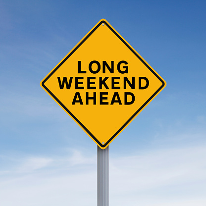 Conceptual road sign indicating Long Weekend Ahead