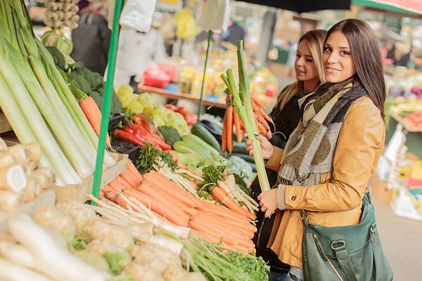 istock Young women at the market 475419735