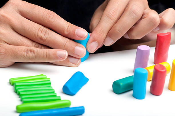 Arts Rolling the polymer clay. handmade polymer clay stock pictures, royalty-free photos & images