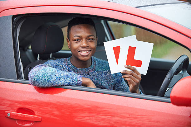 istock Teenage Boy Passing Driving Exam 475425169