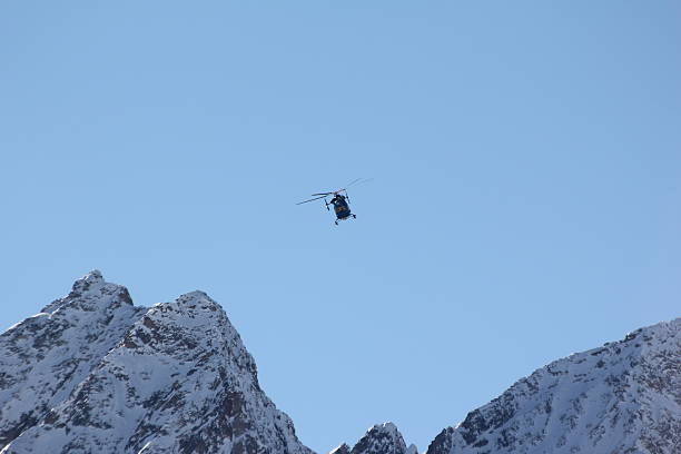 istock Blue helicopter in the clear sky 475426469