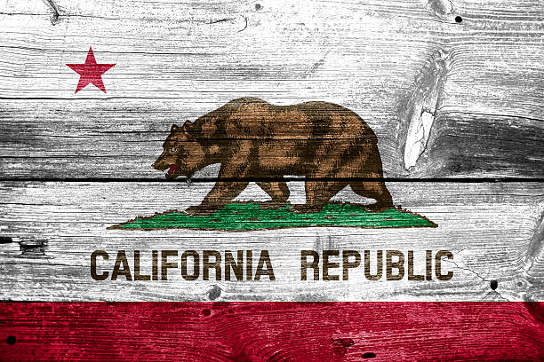 istock California State Flag painted on old wood plank texture 475426893