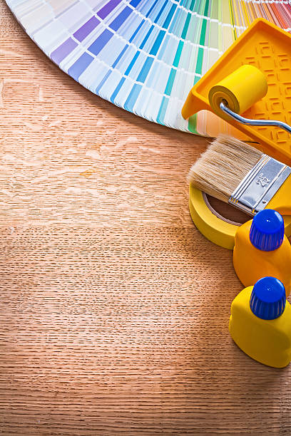 istock House improvement paint tools and pantone fan on wooden board 475428268