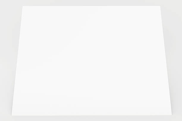 istock Blank sheet of paper with a shadow underneath it 475429518