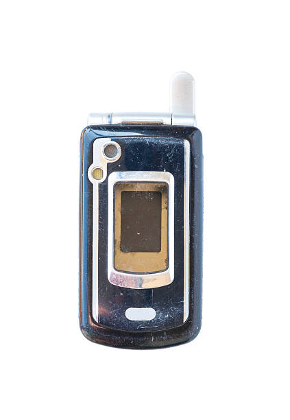 vintage teléfono móvil aislado - medium shot fotografías e imágenes de stock
