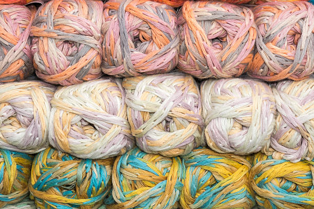 istock Stacked balls of colorful wools 475431788