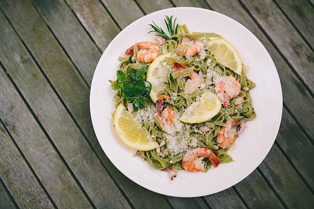 pescados y mariscos, pasta - gran padano fotografías e imágenes de stock