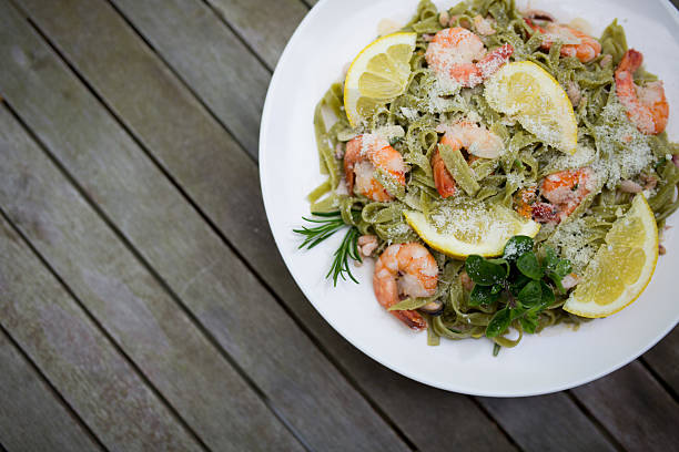 pescados y mariscos, pasta - gran padano fotografías e imágenes de stock