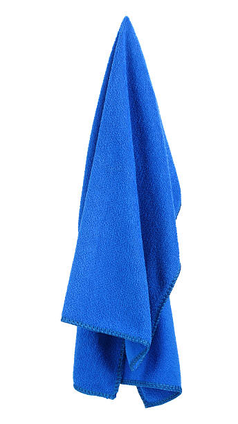 Hanging blue and clean towel Hanging blue and clean towel isolated on white background hanging fabric stock pictures, royalty-free photos & images