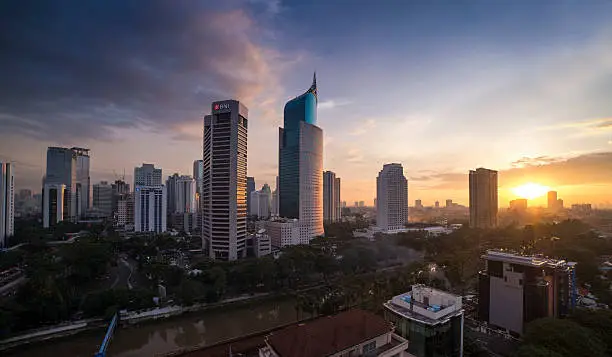 Panorama of Jakarta Skyline at sunset. BNI46 Building from left to right