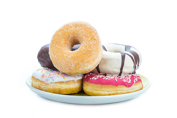 Donuts assortment isolated on a white background stock photo