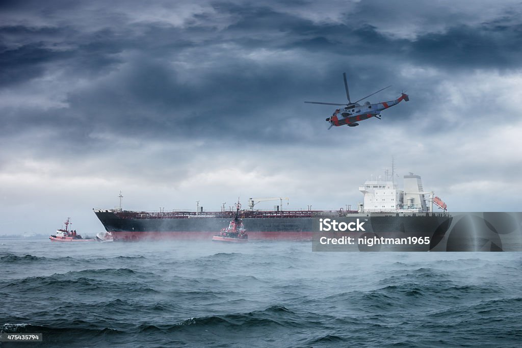 Helicopter Rescue A helicopter rescue mission in difficult stormy weather. Rescue Stock Photo