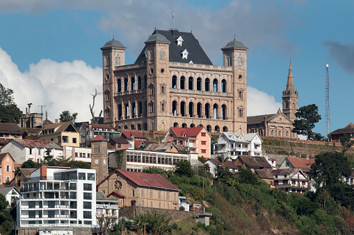 In the central highland of Antananarivo standing on the highest point on the hill is the Rova of Antananarivo or the Royal Palace Complex from the 17th and 18th centuries. The Queens palace or Manjakamiadana stands above churches, hotels and homes on the steep hillside.