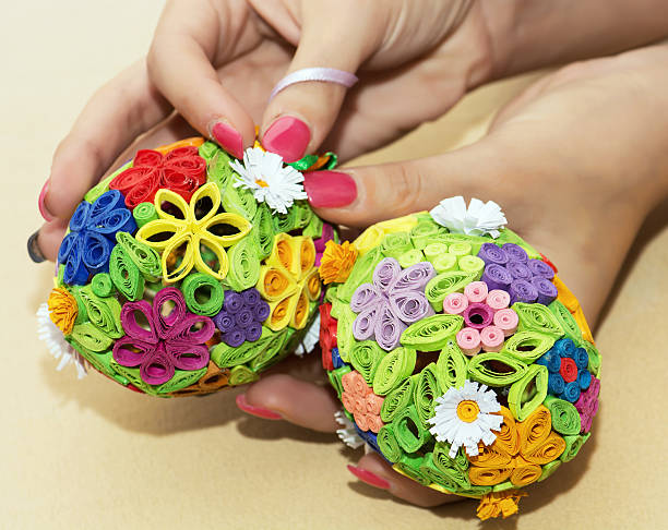 istock Woman holding in the hands two colorful easter eggs 475439257