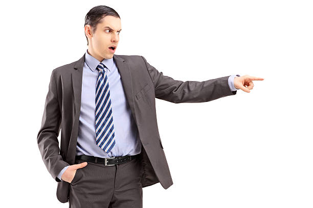 istock Angry businessman pointing with his finger 475440435