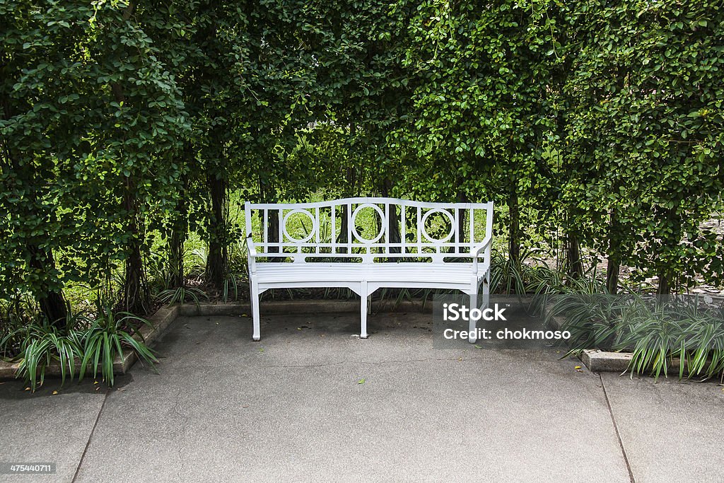 Seat Bench in a garden for relaxing Armchair Stock Photo