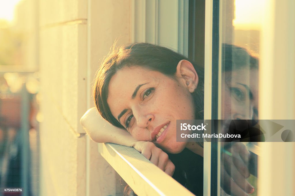 Portrait of beautiful 35 years old woman Portrait of beautiful 35 years old woman on sunset colors 2015 Stock Photo