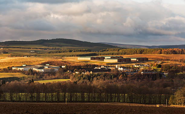 Macallan Distillery. This is view over a glen above Aberlour of the Macallan Distillery, Speyside, Scotland. moray firth stock pictures, royalty-free photos & images