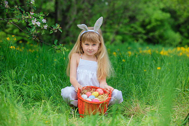 istock Little girl wearing bunny ears 475444716