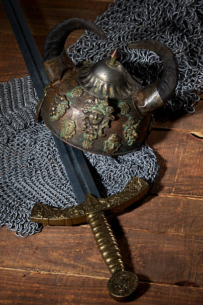 istock sword and the soldier's helmet with horns 475445542