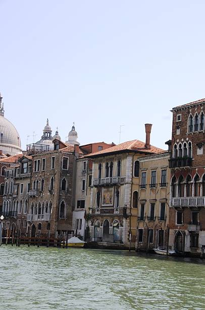 istock Canal Grande in Venice, old and beautiful under blue sky 475445686