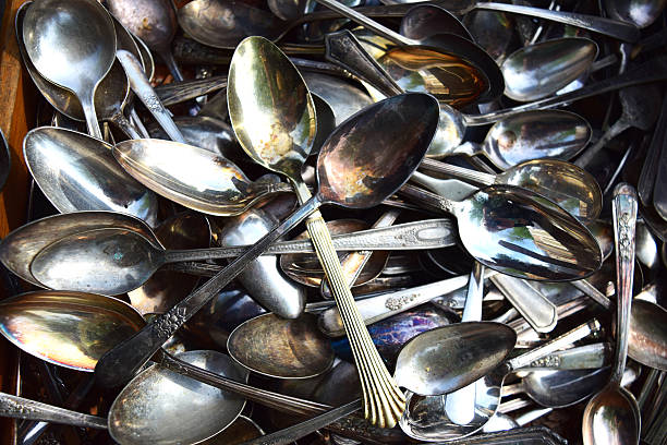 istock Jumble of Tarnished Antique Spoon Treasures 475446528