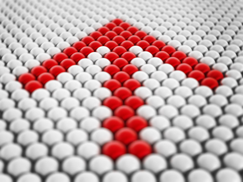 Spheres forming red arrow symbol.Conceptual background.