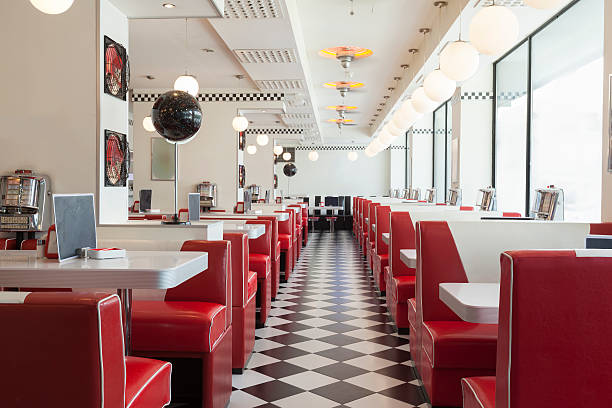 diner restaurant american diner restaurant style in black and white tiles and red booths diner stock pictures, royalty-free photos & images