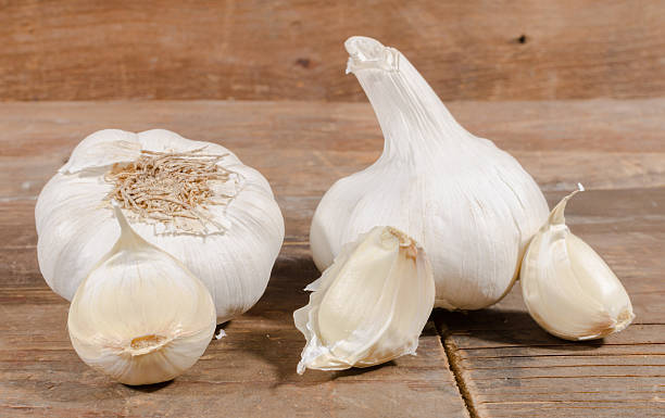 istock White garlic bulbs and cloves 475448614