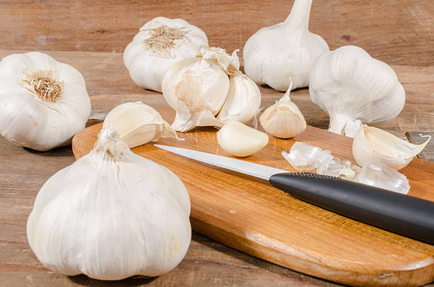 istock White garlic bulbs and cloves 475448634
