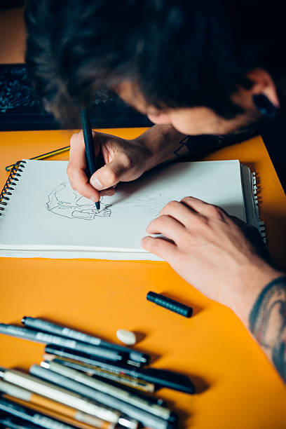 istock Tattoo Artist Drawing 475448680