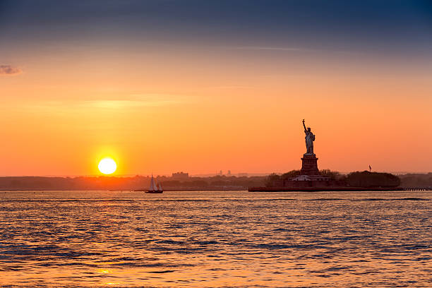 istock Statue of Liberty at sunset 475449512