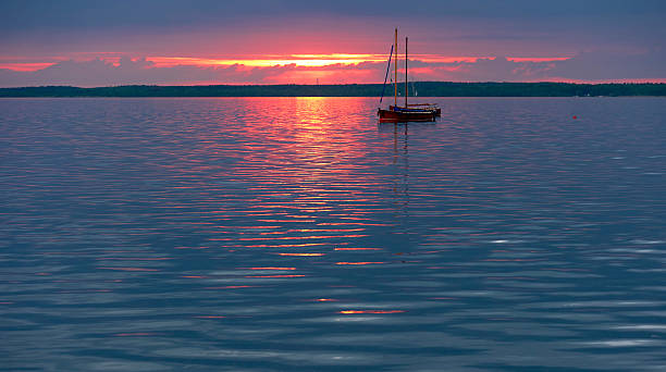 istock Sailboats on lake at Dusk 475450252