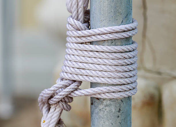 istock tied rope on the pole nature background 475450874