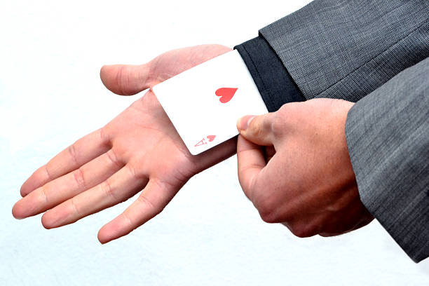 Ace card held by business man Ace card held by business man ganar stock pictures, royalty-free photos & images