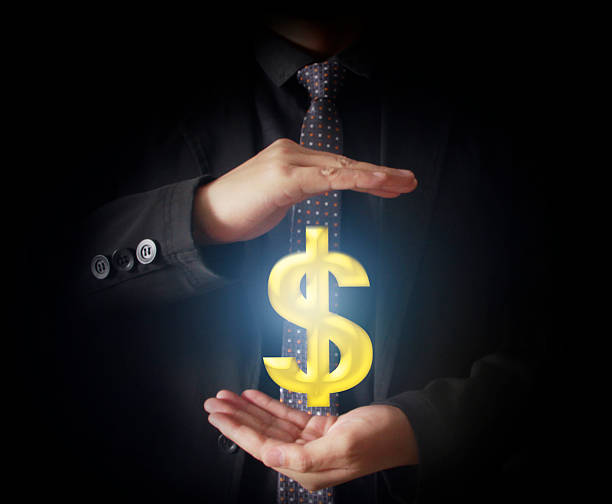 istock Man touching online button with money icon 475452526