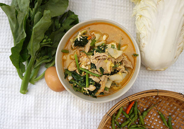 istock Homemade Thai style spicy vegetable with chicken soup 475453226