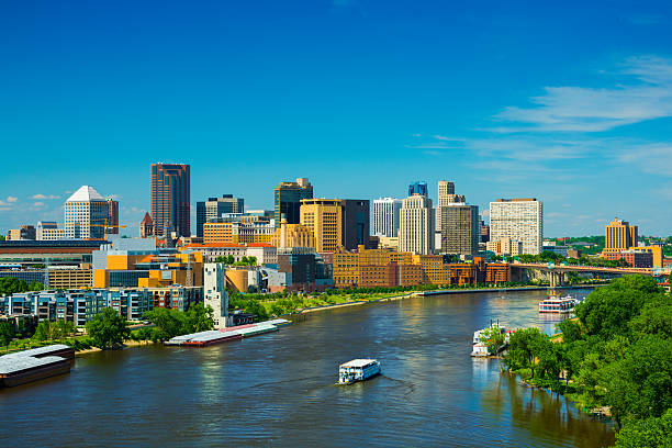 Saint Paul, MN skyline and river Saint Paul downtown skyline with the Mississippi River in the foreground.  Saint Paul is part of the Minneapolis - Saint Paul Twin Cities area. minnesota stock pictures, royalty-free photos & images