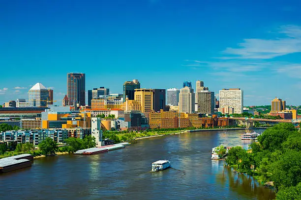 Saint Paul downtown skyline with the Mississippi River in the foreground.  Saint Paul is part of the Minneapolis - Saint Paul Twin Cities area.