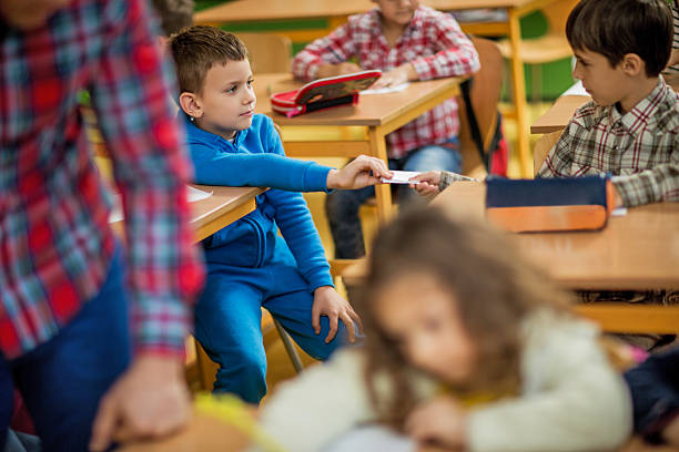 Students Passing Notes In Class 120+ Kids Passing Note In Class Stock Photos, Pictures & Royalty-Free ...