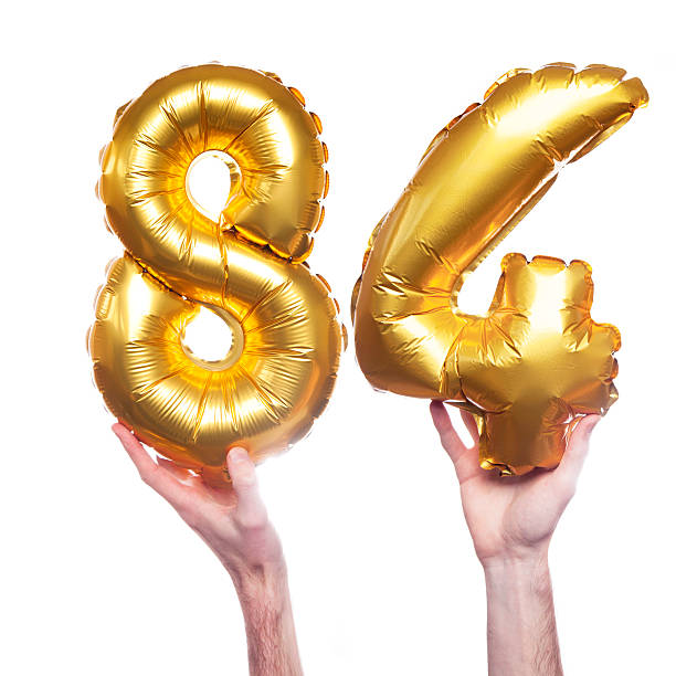 istock Gold number 84 balloons 475455962