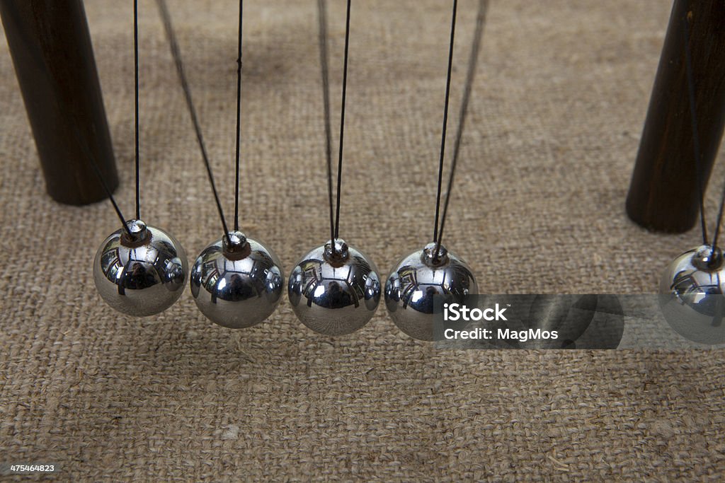 Newton's pendulum Newton's pendulum containing five metal balls Activity Stock Photo