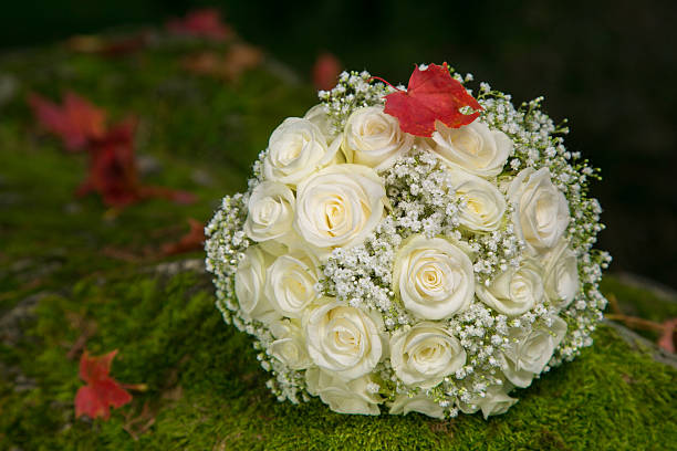 wedding bridal bouquet with autumn leaf stock photo