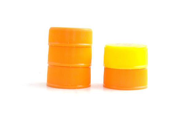 istock Orange and Yellow Plastic Caps of the bottle 475466250