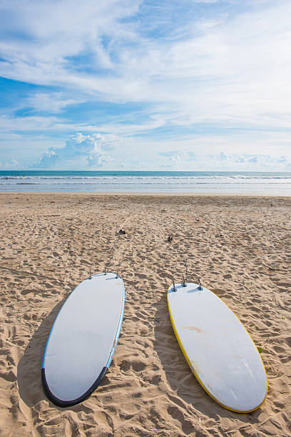 istock surfboards on sand at the beach 475466536