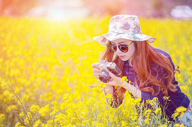 istock woman taking photos 475466600