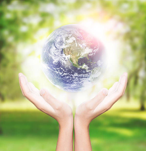 istock hand hold earth environment concept element finished by nasa 475468368